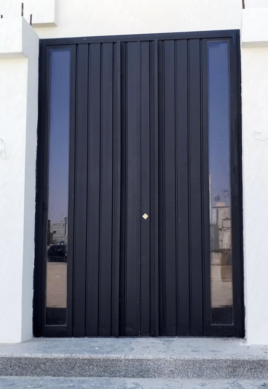 باب حديد مع تيوبات حديدية 1